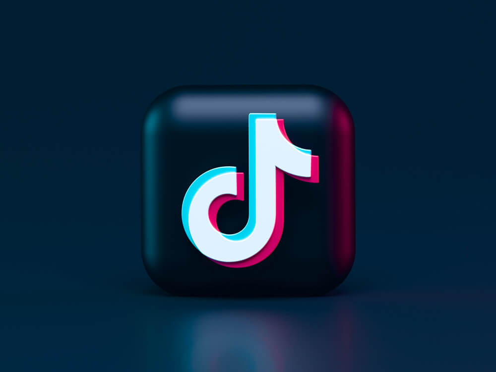 Tiktok video logo on a dark blue background - learn how to edit Tiktok videos