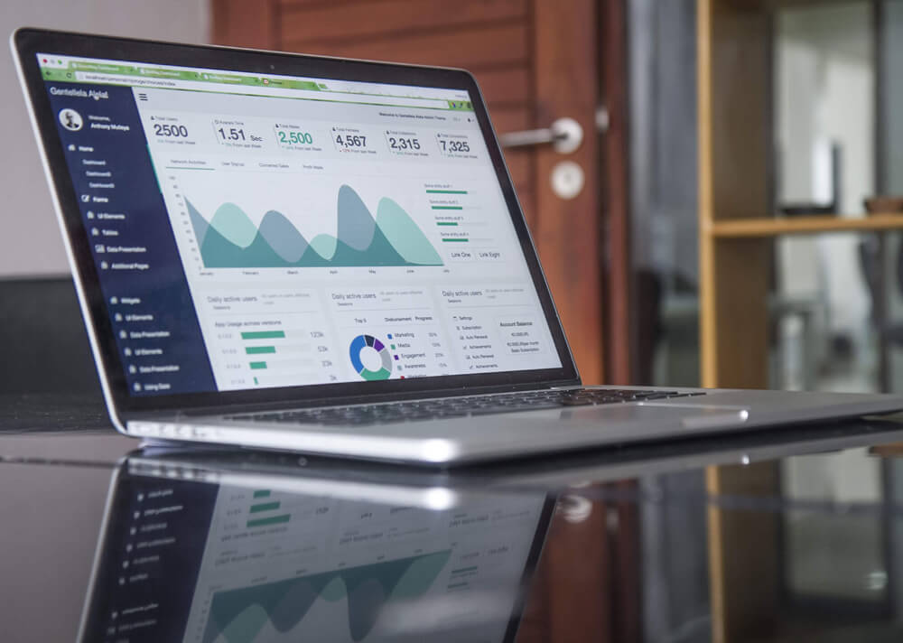 How Web Design Impacts Business - Photo of graph on a computer screen