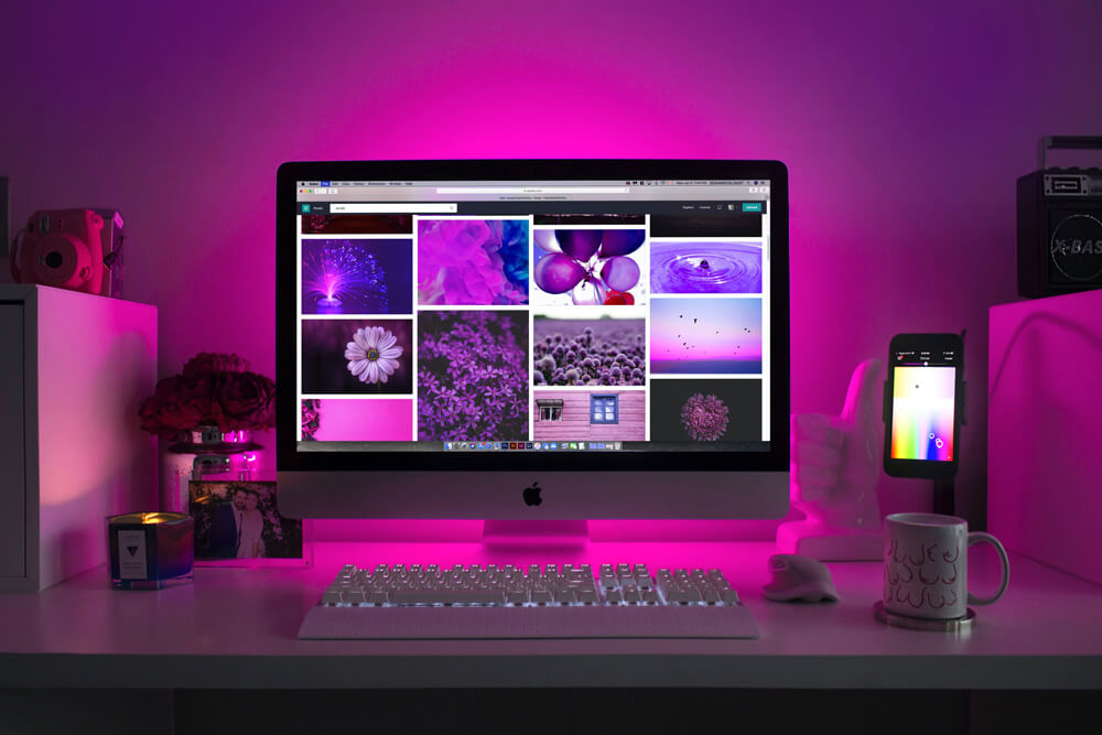 Website Homepage Shown On a Desktop Computer And A Phone