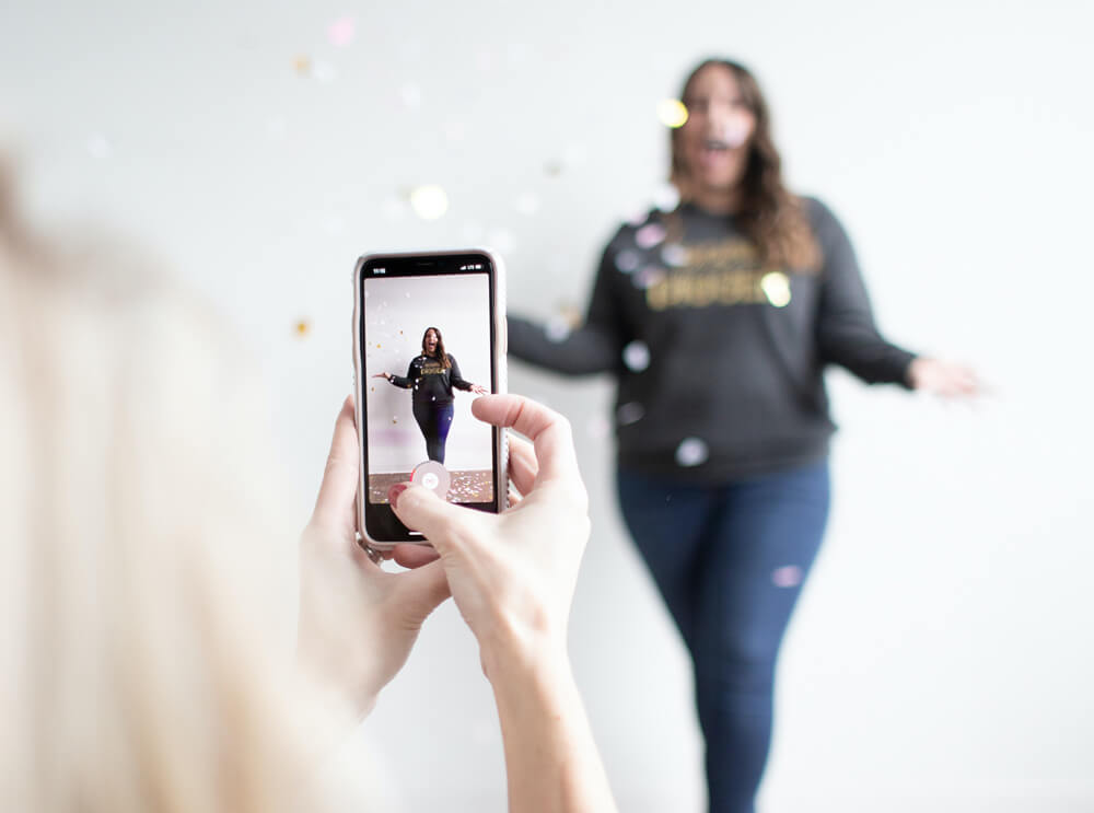 Tiktok Marketing Profile Optimization - One woman filming a Tiktok Video for another woman